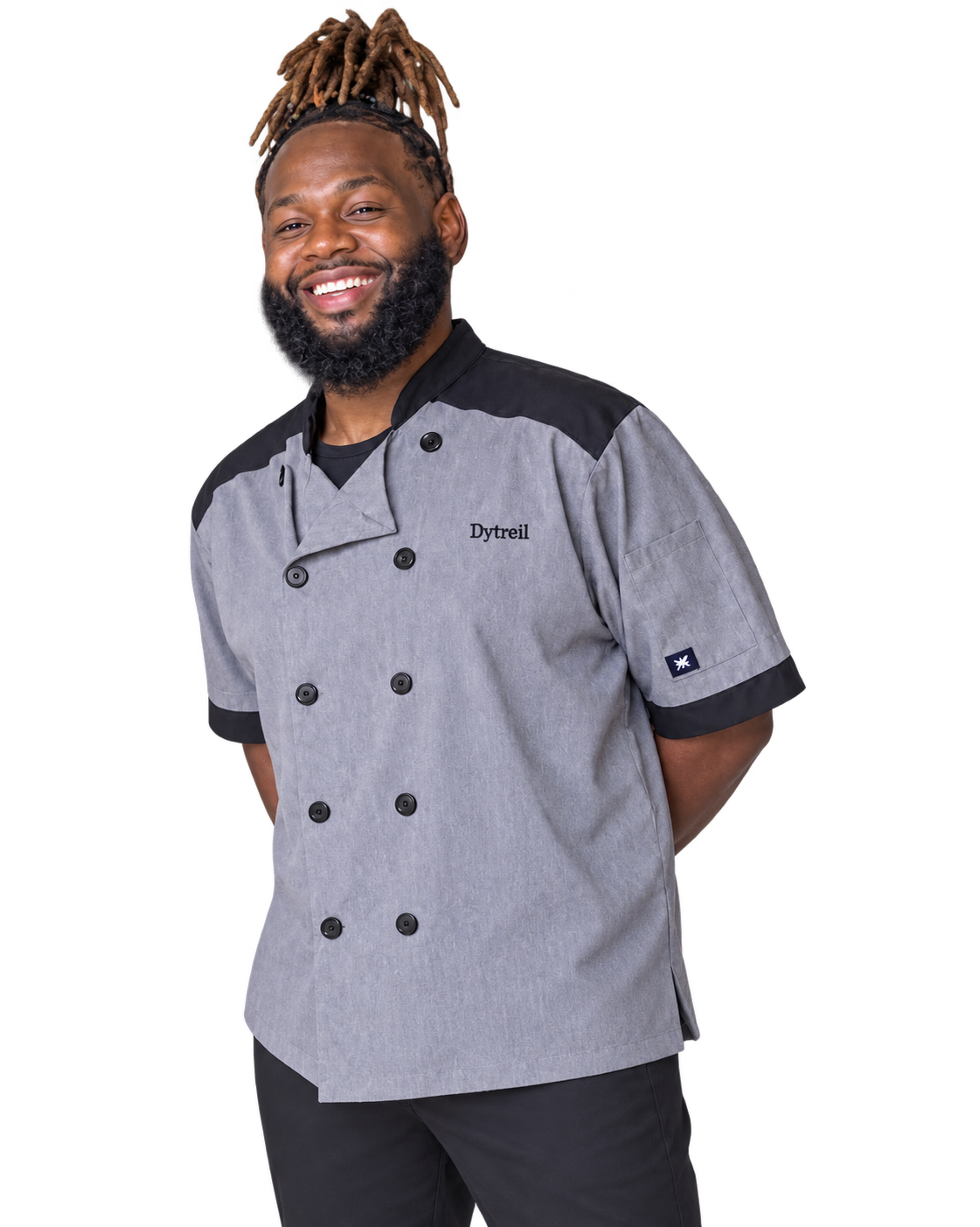 Chef Dytreil Gray Smiling In His Gray And Black Chef Coat